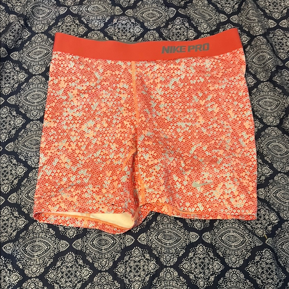 Nike Orange Athletic Shorts Lightweight and Eye-Catching